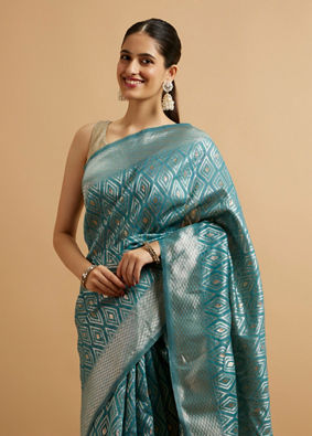 alt message - Mohey Women Light Blue Ikat Diamond Patterned Saree with Floral Motifs image number 1